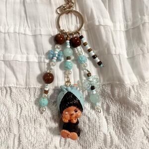 Baby blue bonnet vintage PVC monchichi figure bag charm/keychain